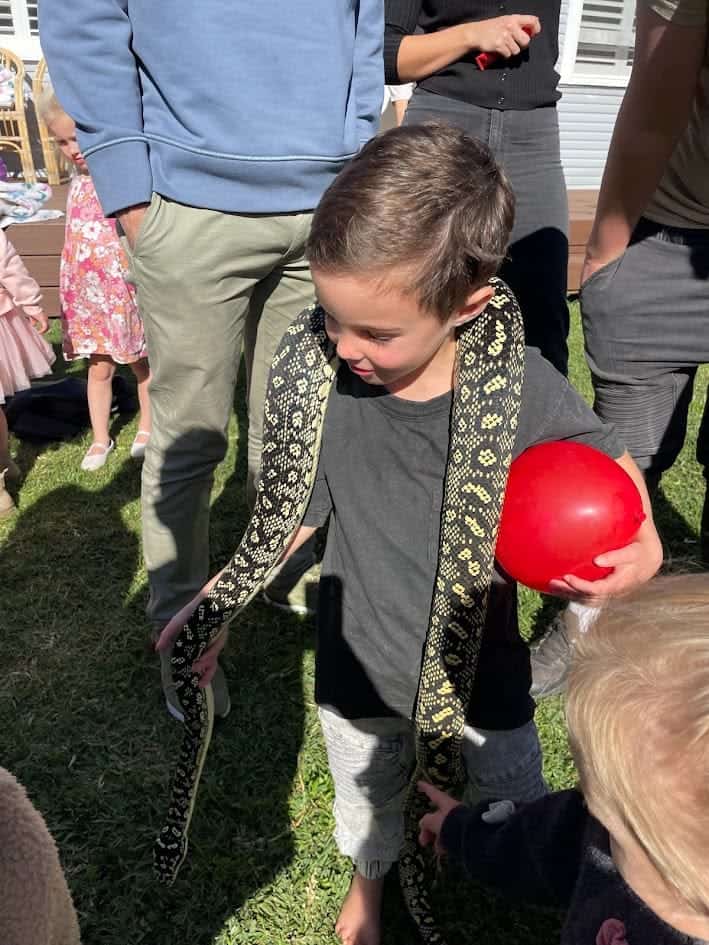 James Son holding Snake James Son holding Diamond Python Sname